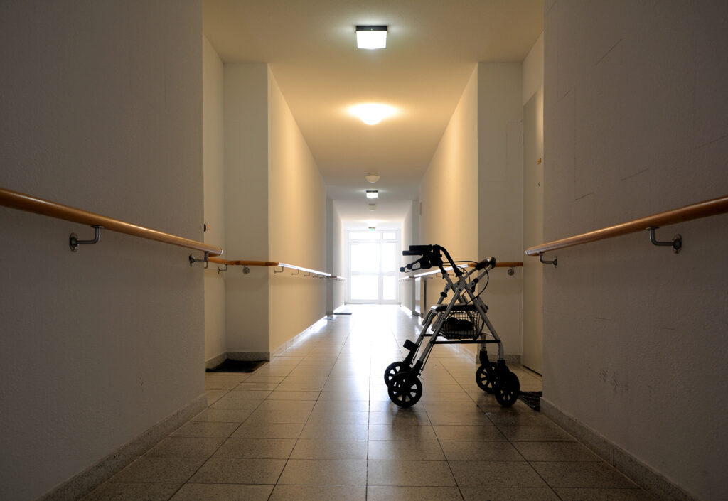 walker sitting in empty hall